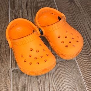 Baby/Toddler orange crocs size 4